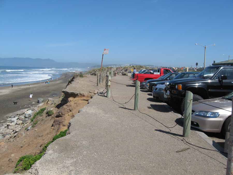 Parking at Sloat Avenue shows new erosion and old rip rap.