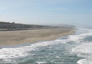 The wide Ocean Beach has plenty of room for hikers and beach visitors